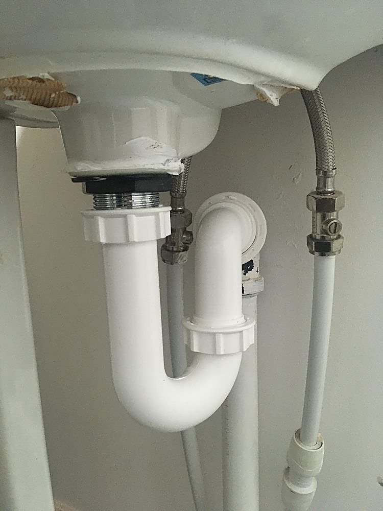 General plumbing and pipework repair under a sink by Rapid Plumbing and Build in Sheffield